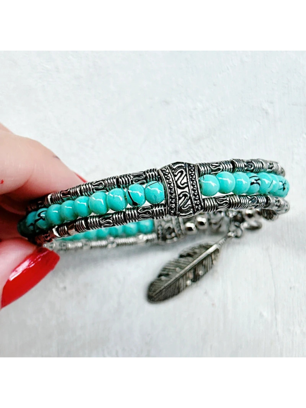 2559mc. Silvertone Feather Bracelet